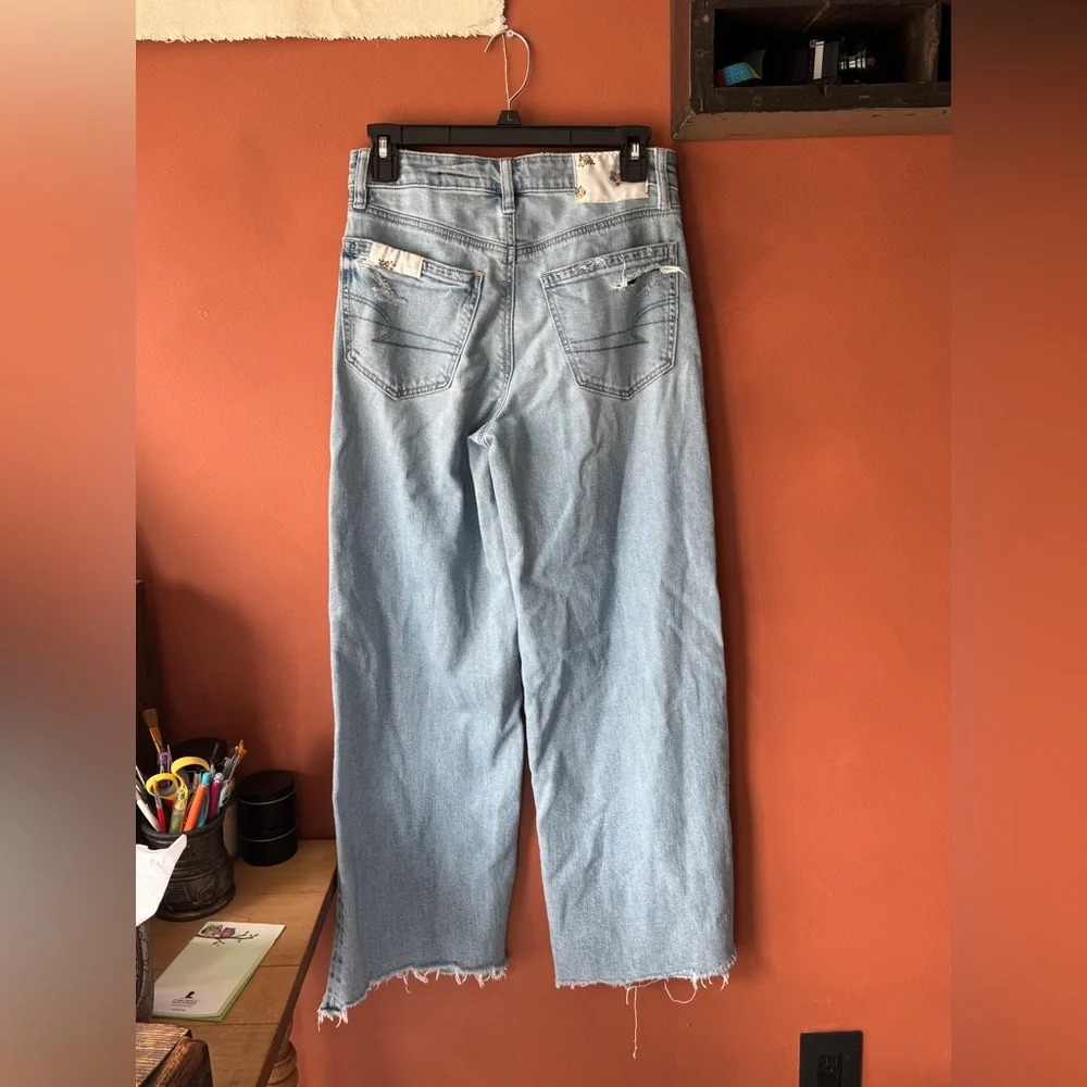 American Eagle Outfitters Light Wash Straight-Leg Jeans with Blue Floral Patches - Picture 3 of 6